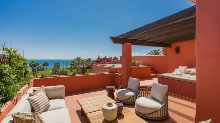 Refined beachfront duplex penthouse with Andalusian elegance, New Golden Mile, Estepona