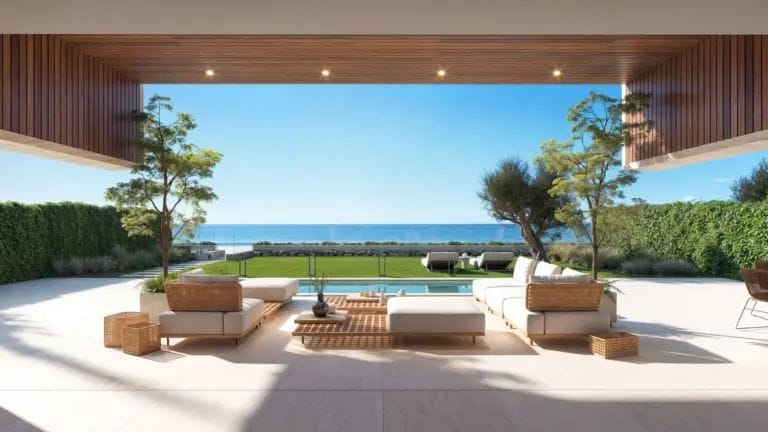 Sophisticated Ground Floor Beachfront Apartment with Private Garden in Manilva